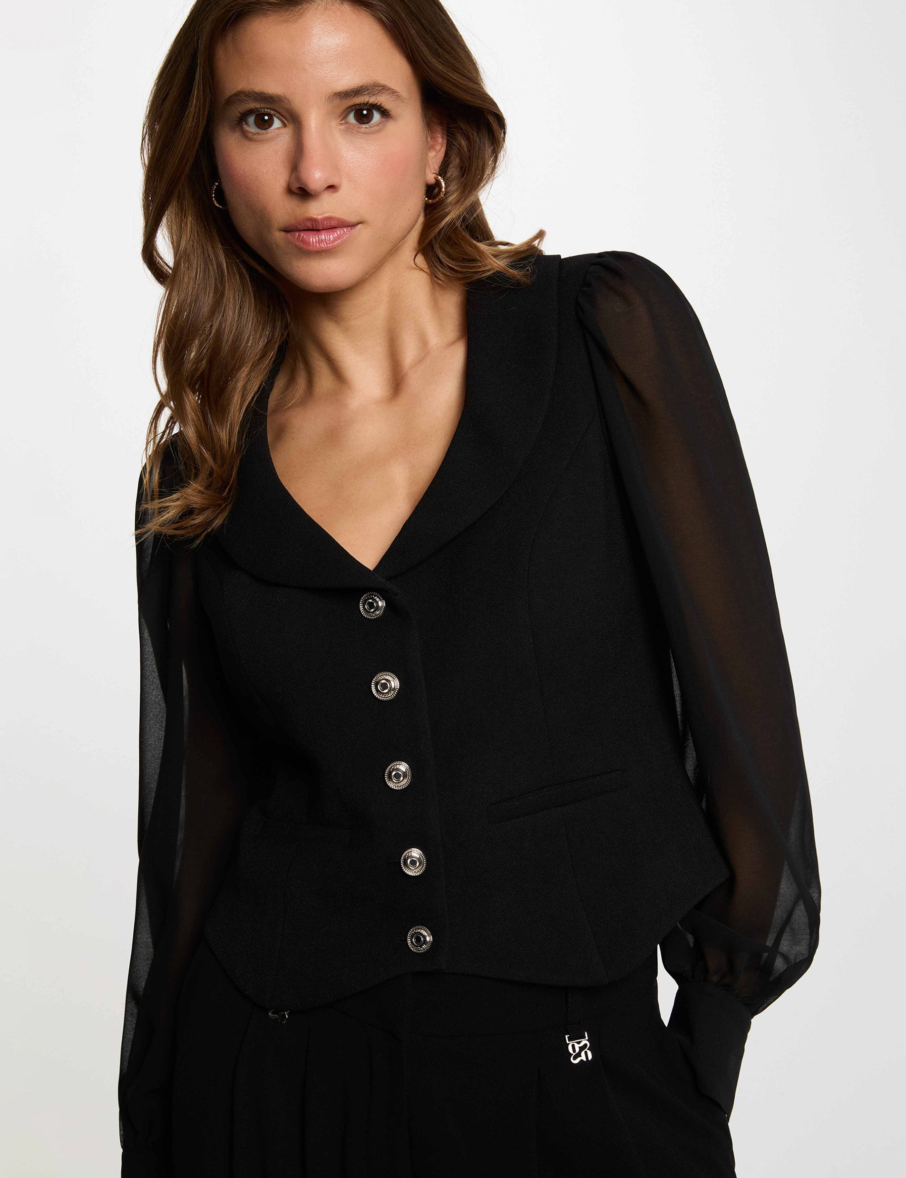 Gilet manches bouffantes noir femme
