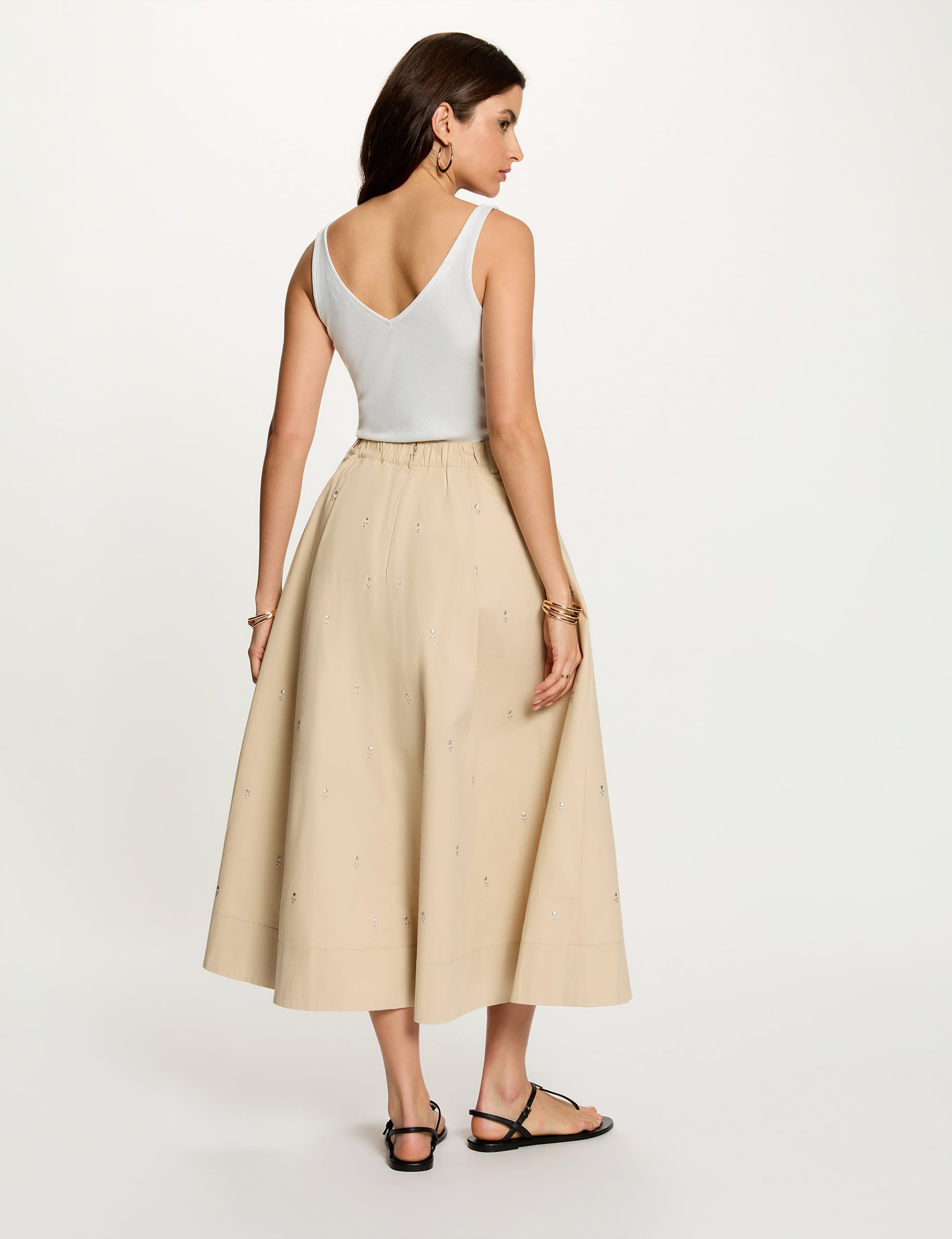 D&eacute;bardeur brillant col v blanc femme